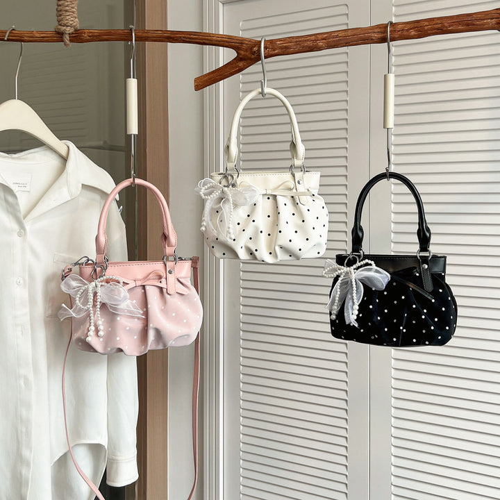 Stylische Pünktchen-Handtasche