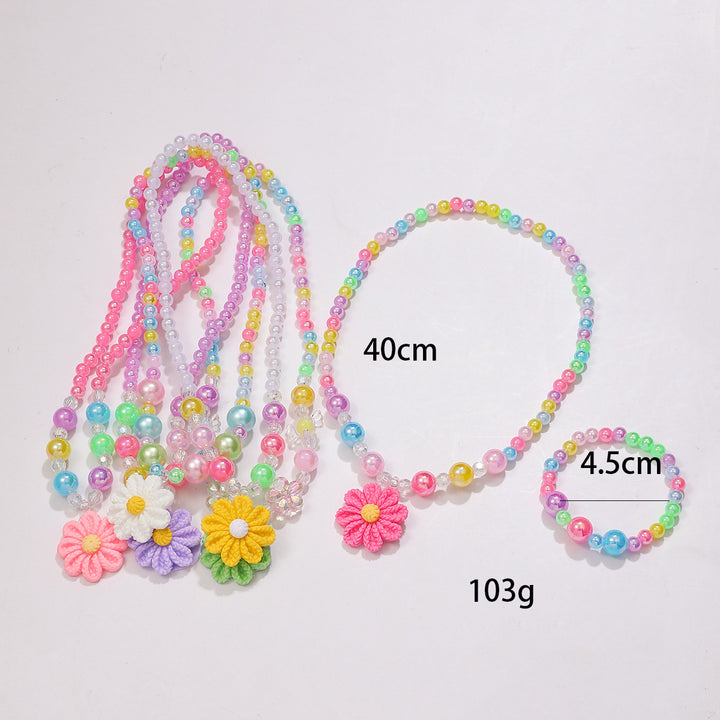 Verspieltes Schmuckset mit Blumenanhänger Karnz