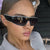 Damen modische Sportsonnenbrille mit innovativem Design und breitem Rahmen Karnz