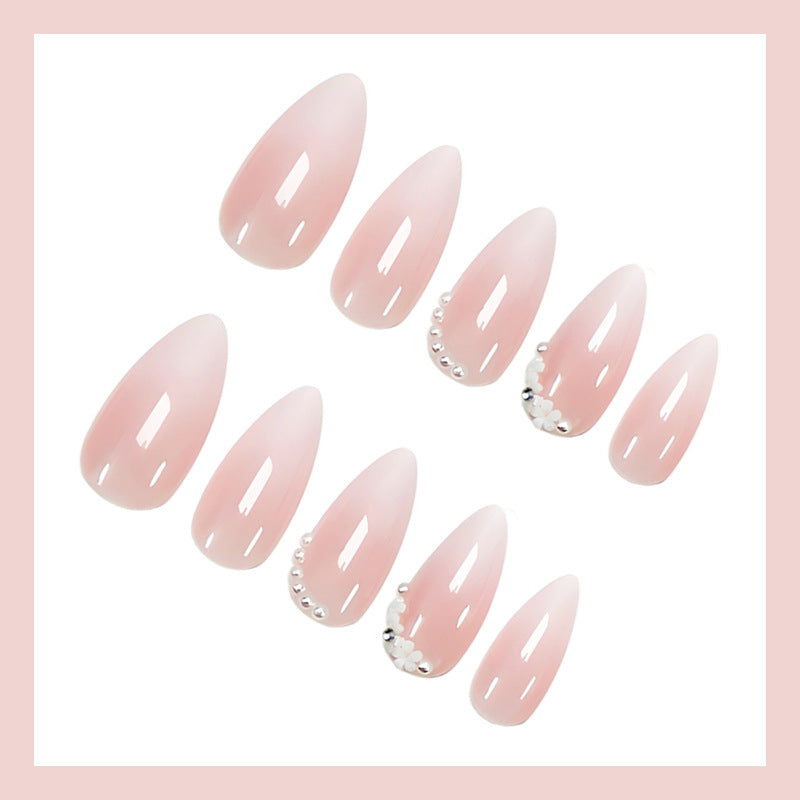 Kunstnagelset mit eleganten Ombre-Effekten und Glitzerakzenten Karnz
