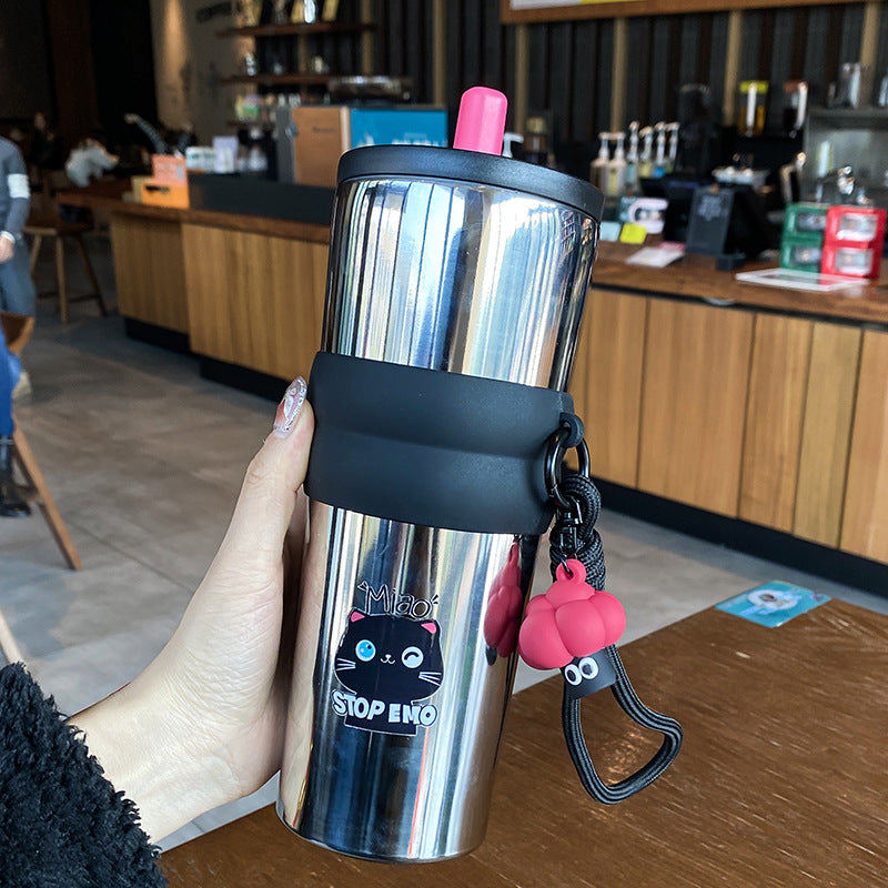 Damen verspielter Kaffeebecher mit Silikonhülle und integriertem Anhänger Karnz