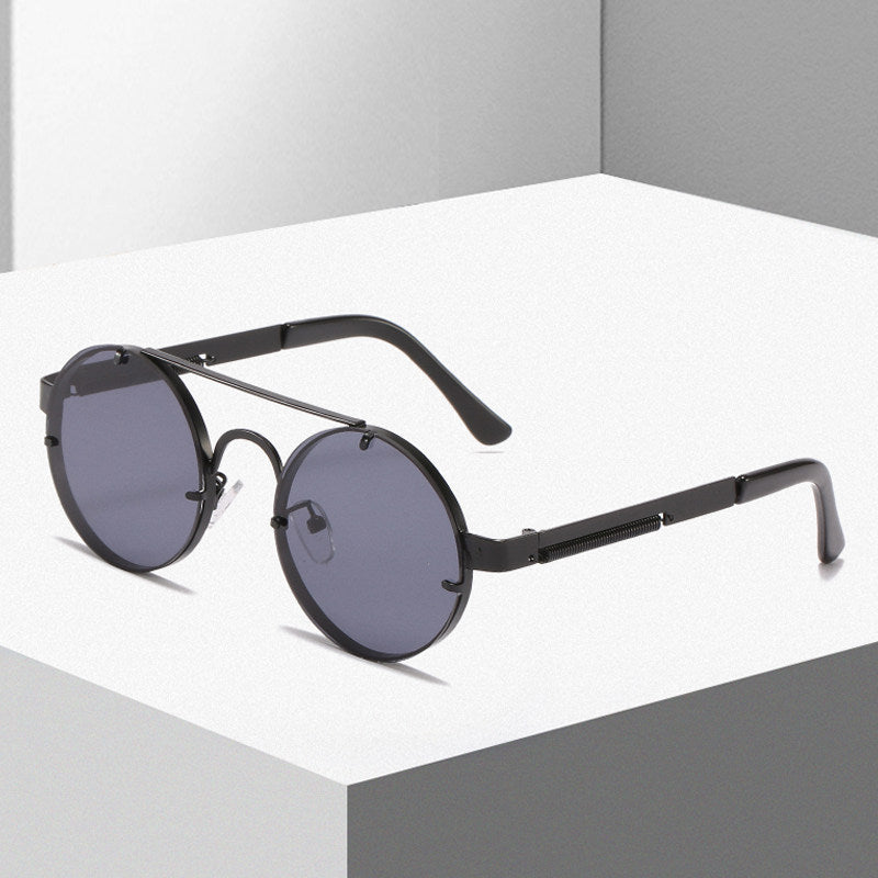 Damen runde Designer-Sonnenbrille mit innovativem Metallgestell und schützenden Gläsern Karnz
