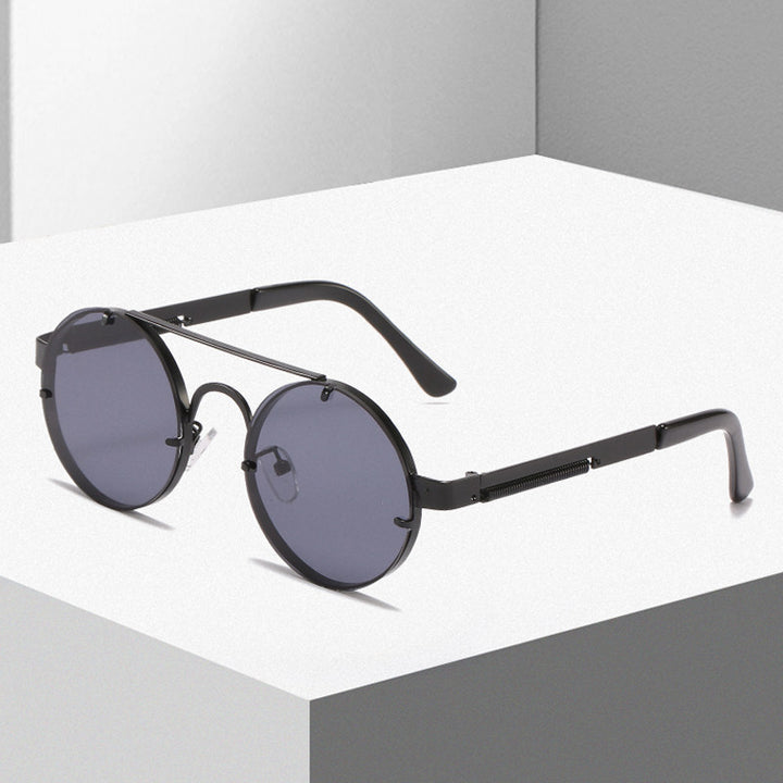 Damen runde Designer-Sonnenbrille mit innovativem Metallgestell und schützenden Gläsern Karnz