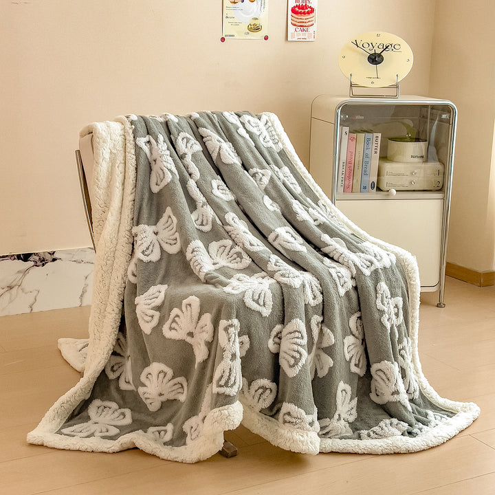 Gemütliche floral gemusterte Fleece-Decke