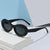 Damen modische Sonnenbrille im ovalen Design Karnz
