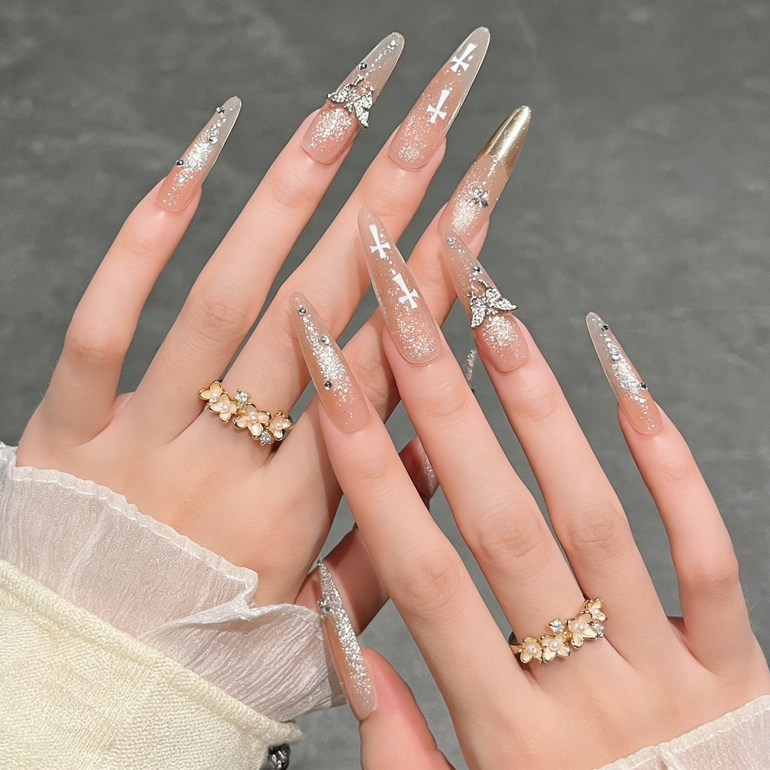Elegante Stiletto Press-On-Nagelverlängerungen mit Edelsteinakzenten Karnz