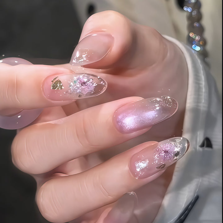 Kunstnägel mit Glamourösem Glitzer- und Blumen-Design Karnz