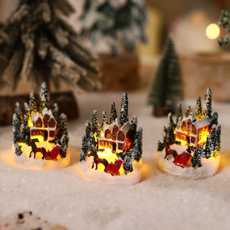 Beleuchtete Weihnachtsdorf-Szene Karnz