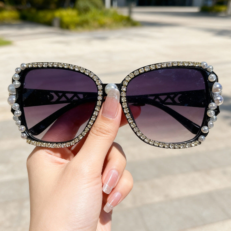 Verschnörkelte Katzenaugen-Sonnenbrille Karnz