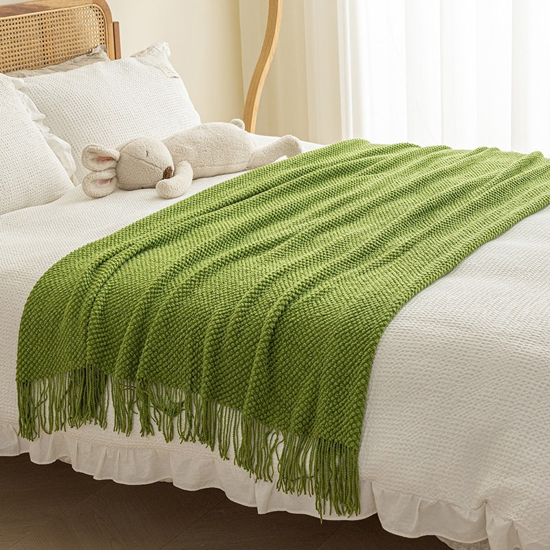 Strukturierte Strickwurfdecke