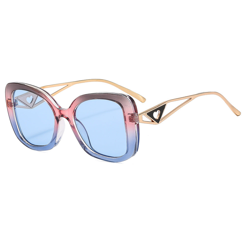 Damen modische oversized Sonnenbrille mit luxuriösem Herzdetail Karnz