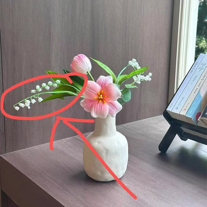 Dekorative künstliche Blumenarrangement