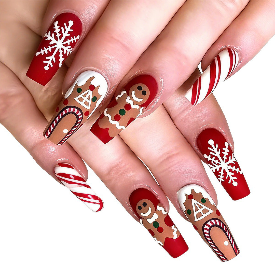 Festliche Kunstnägel mit Weihnachtsmotiv Karnz