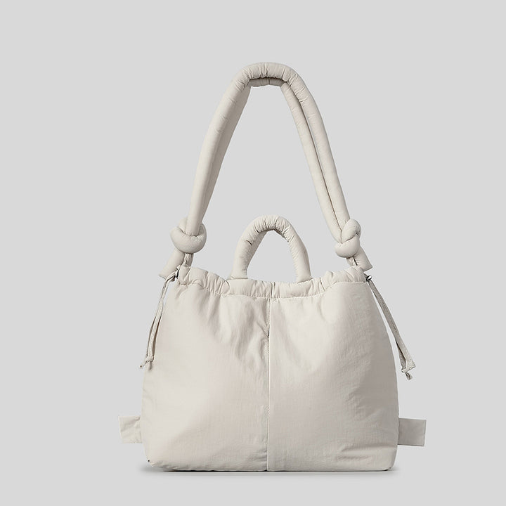 Modebewusste gepolsterte Schultertasche