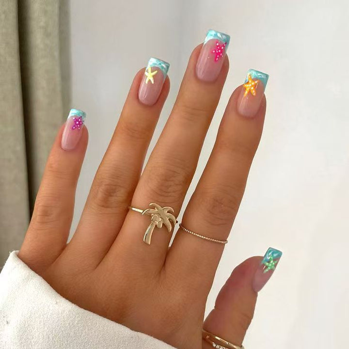 Kreatives Kunstnagelset mit tropischem Strand-Stil Karnz