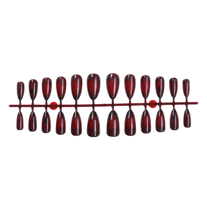 Kunstnagelset mit elegantem länglichen Design Karnz