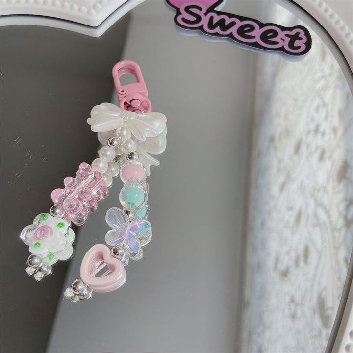 Dekorativer Charm-Handyband Karnz