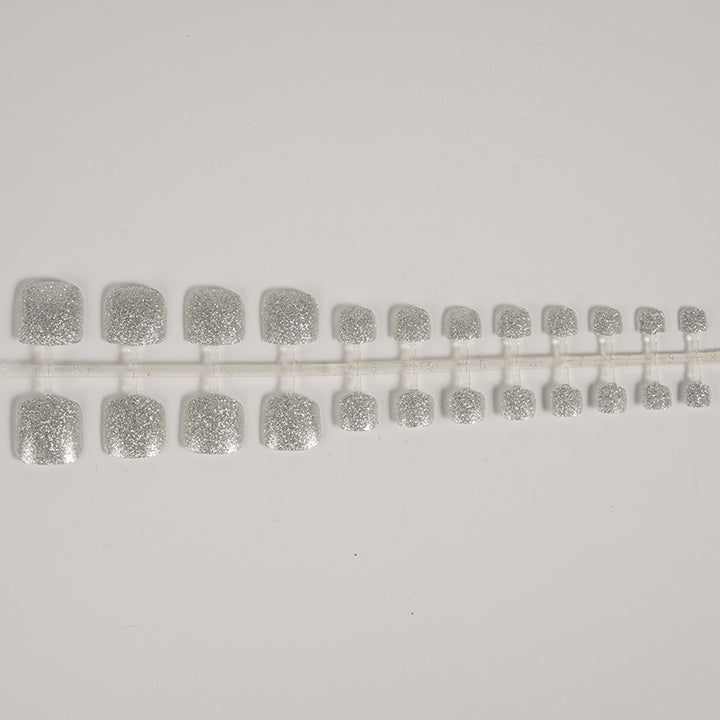 Glitzernde Press-On Fußnagelkunst Karnz