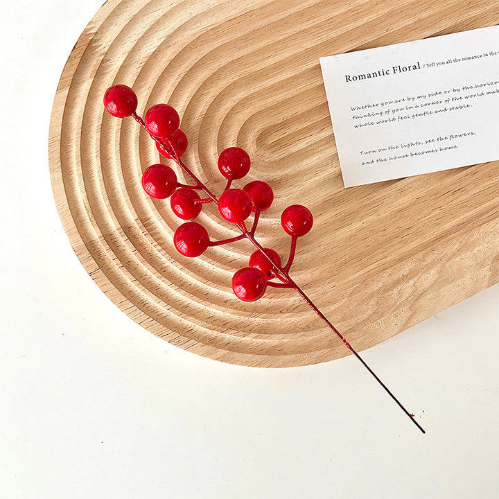 Dekorativer Künstlicher Zweig mit leuchtenden roten Beeren Karnz
