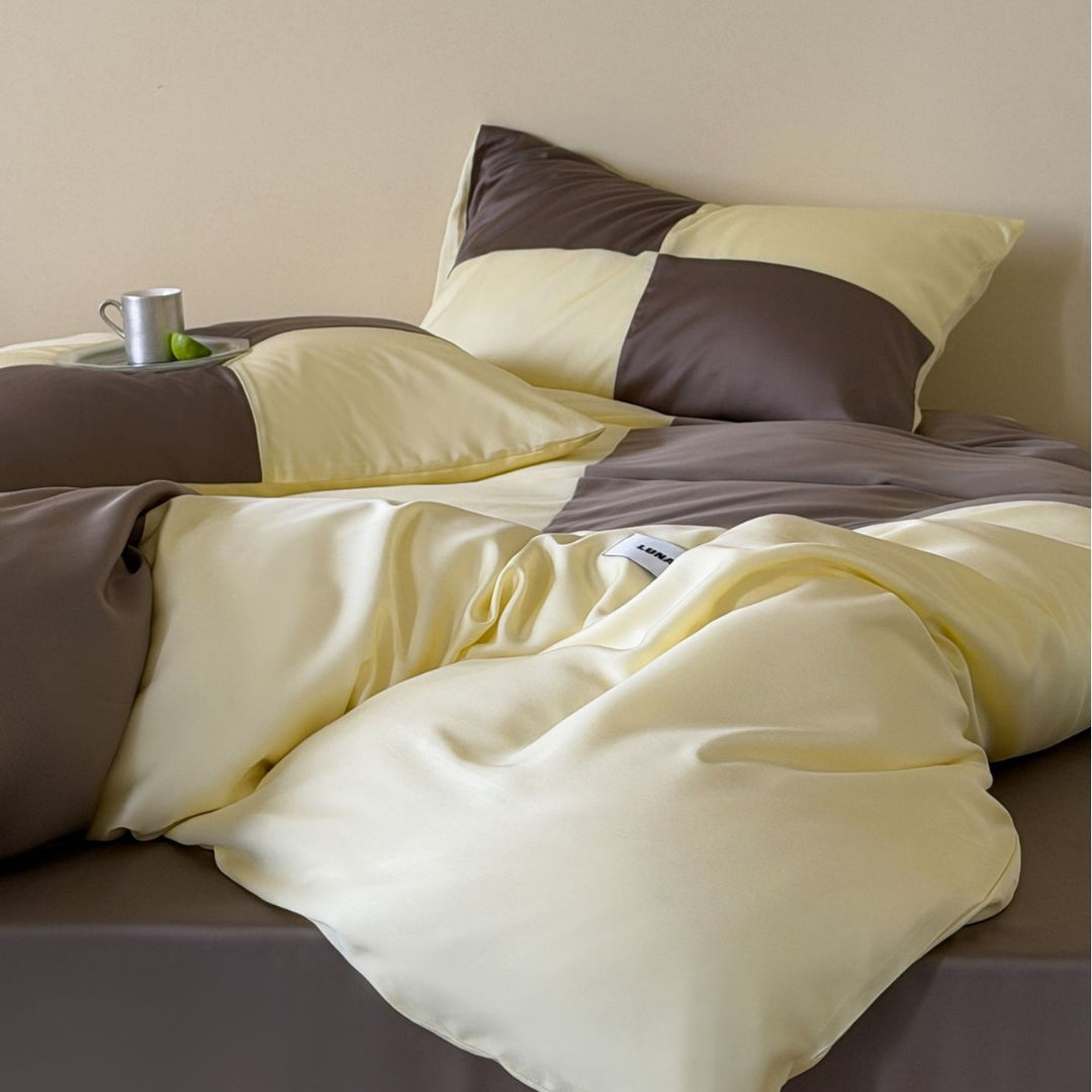 Zweiseitiges glänzendes Satin-Bettwäsche-Set mit kontrastierenden Paneelen und seidigem Griff