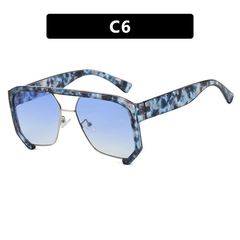 Damen modische Oversized-Sonnenbrille mit eleganter, facettierter Rahmenkonstruktion Karnz