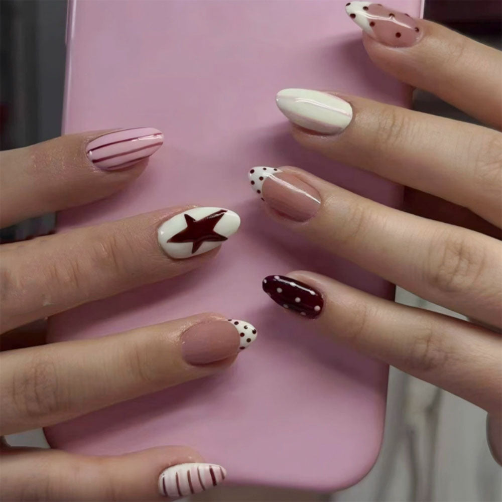 Künstlerisches Press-On-Nagel-Set mit Stern- und abstrakten Designs