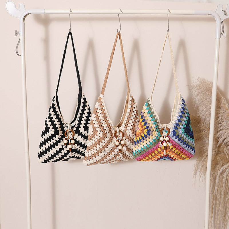 Damen Handtasche mit kunstvollem Flechtmuster Karnz