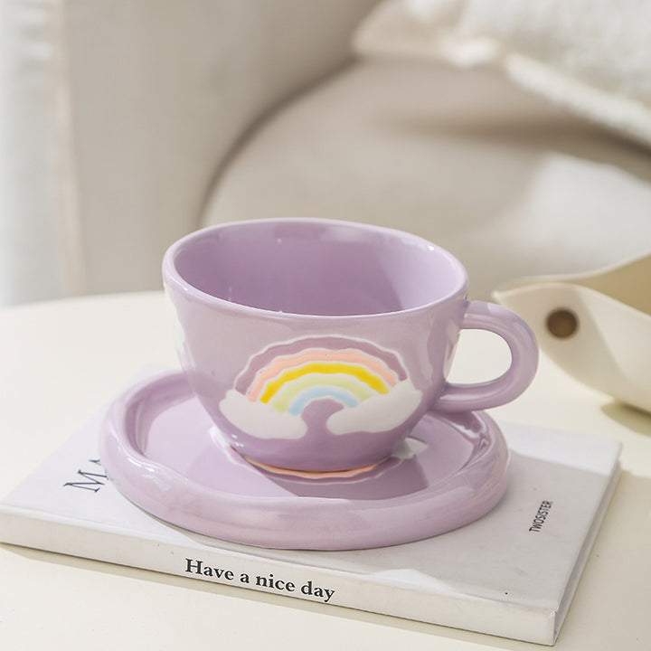 Steinzeug-Frühstücksbecher mit Unterteller und reliefiertem Regenbogenmotiv