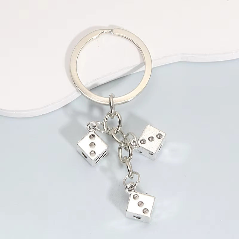 Würfel-inspirierter Charm-Schlüsselanhänger Karnz