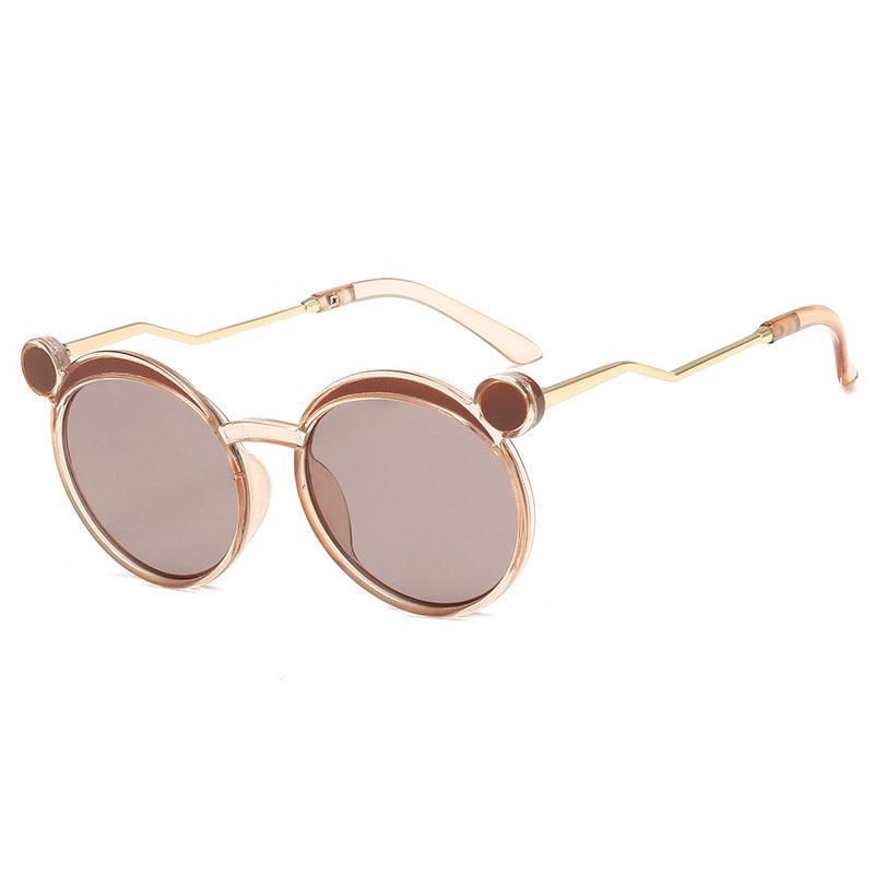 Damen Fashion-Runde Sonnenbrille mit innovativem Rahmen und farbigen Gläsern Karnz