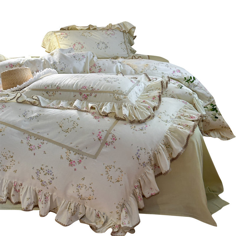 Vintage-inspiriertes Baumwoll-Leinen-Bettwäsche-Set mit Aquarellblumenprint und Rüschendetails