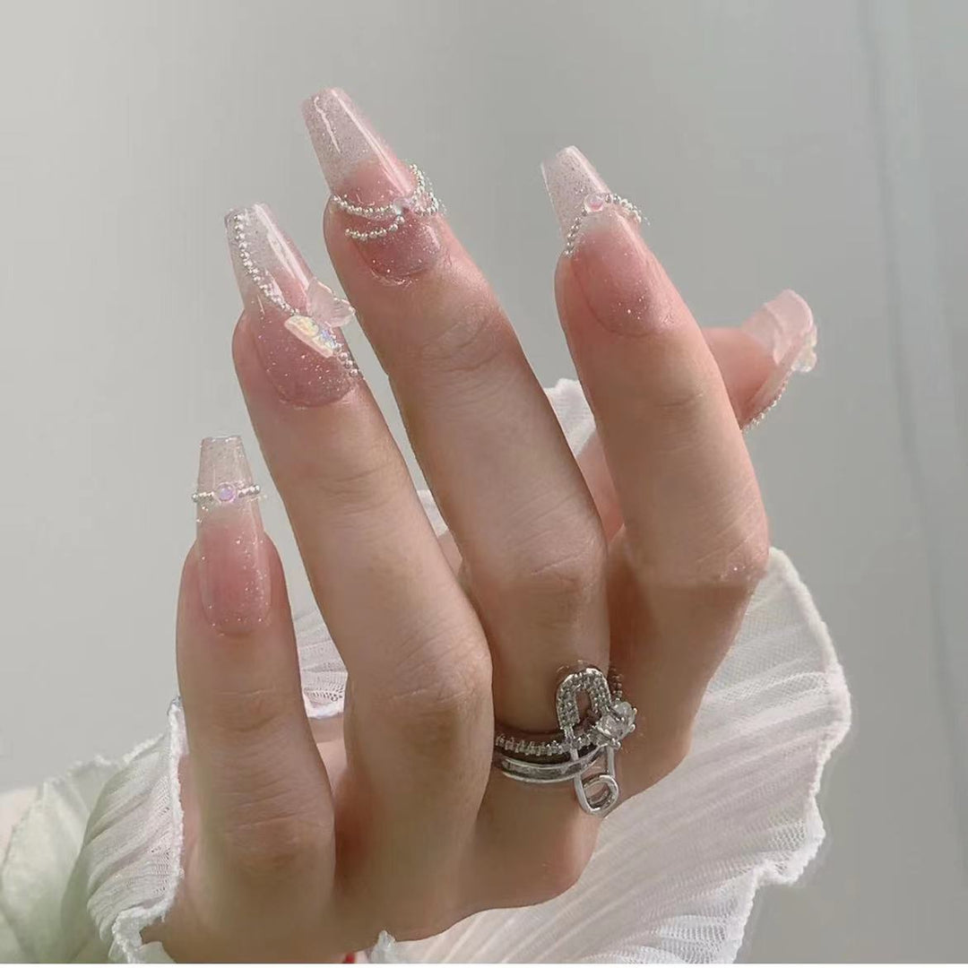 Dekoratives Press-On Nagelset mit Kristallakzenten