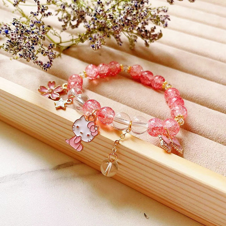 Elegantes Armband mit Tier- und Glitzeranhängern Karnz