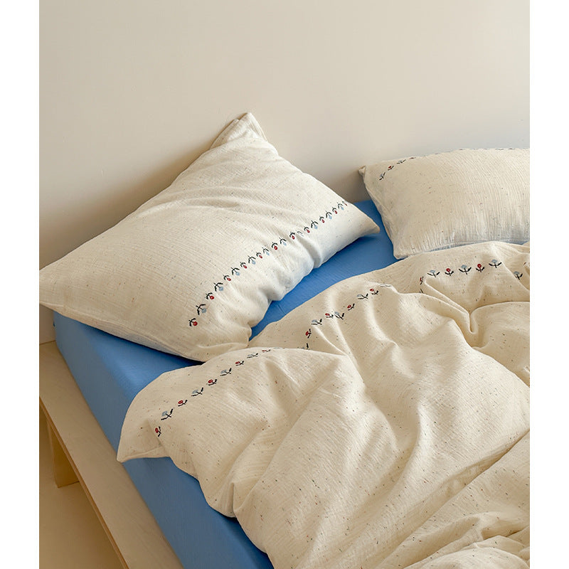 Baumwoll-Gauze Bettbezug-Set mit zarter Bordürenstickerei und melierter Nepsstruktur