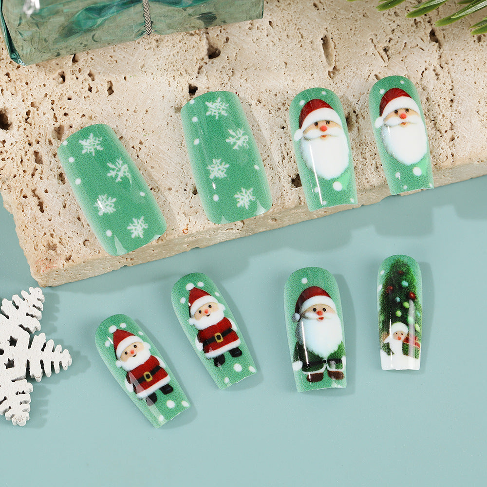Glitzernde Kunstnägel im festlichen Weihnachtsdesign Karnz