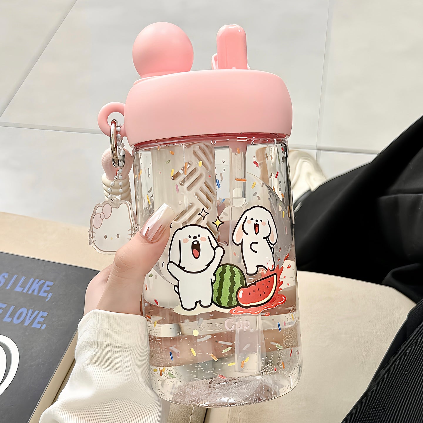 Damen Trinkflasche mit integriertem Tiermotiv und praktischem Tragegriff Karnz