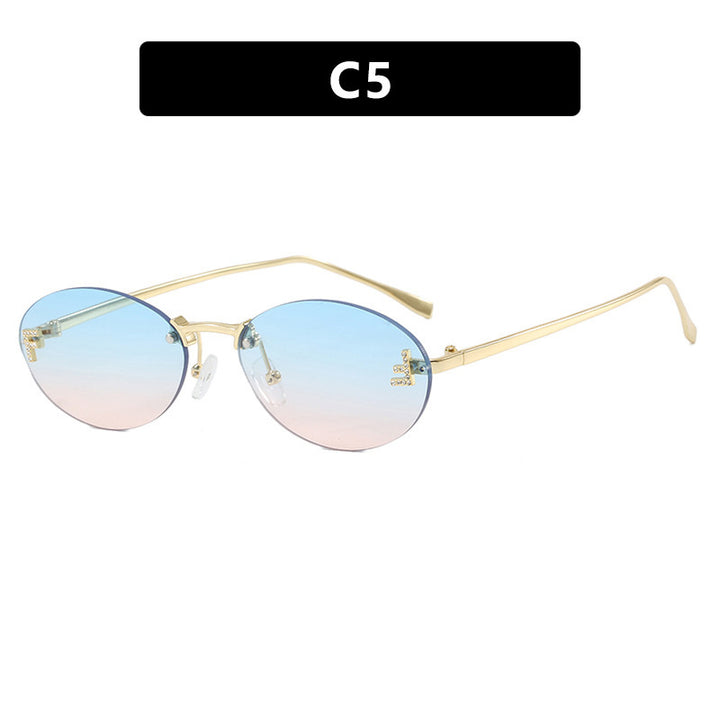 Damen modische Sonnenbrille mit eleganten, runden Gläsern und filigranem Metallrahmen Karnz