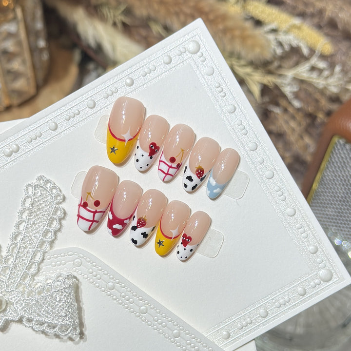 Kreatives fruchtfarbenes Press-On-Nagelset Karnz