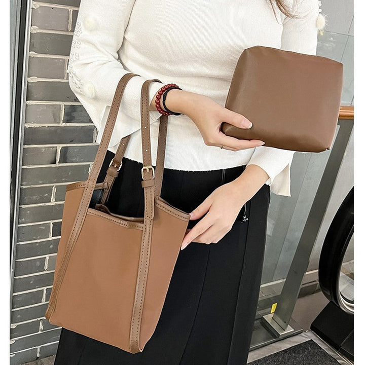 Minimalistische Zip-Top Handtasche Karnz