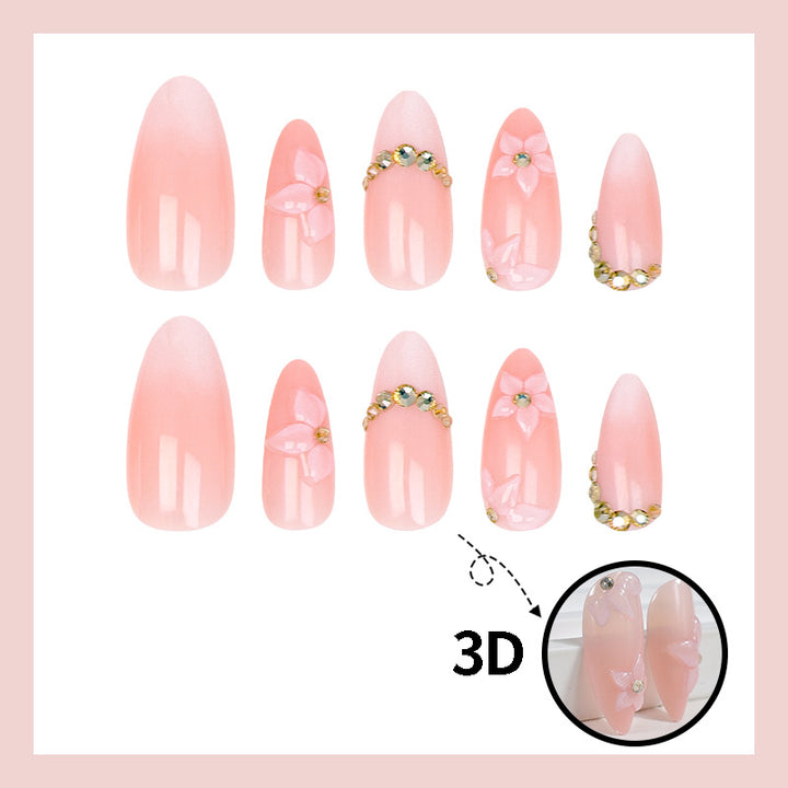 Kunstnagelset mit romantischen Blüten- und Glitzerakzenten Karnz