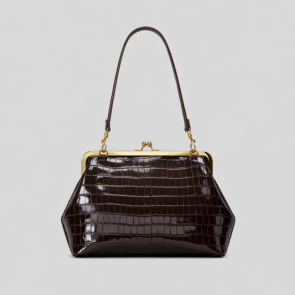Elegante glänzende Krokodil-Effekt-Handtasche