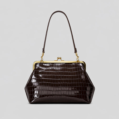 Elegante glänzende Krokodil-Effekt-Handtasche