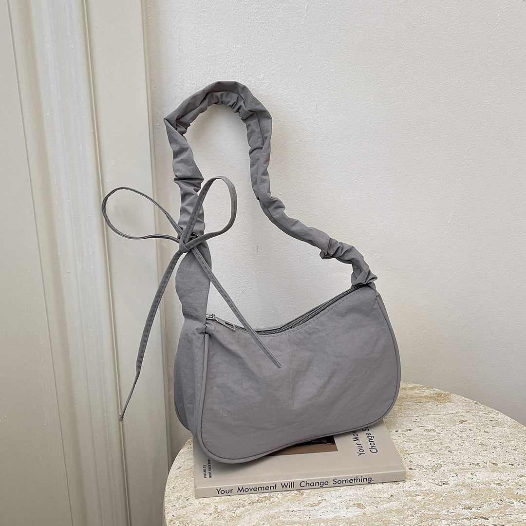 WoTexturiertes Stoff Sling Bag Karnz