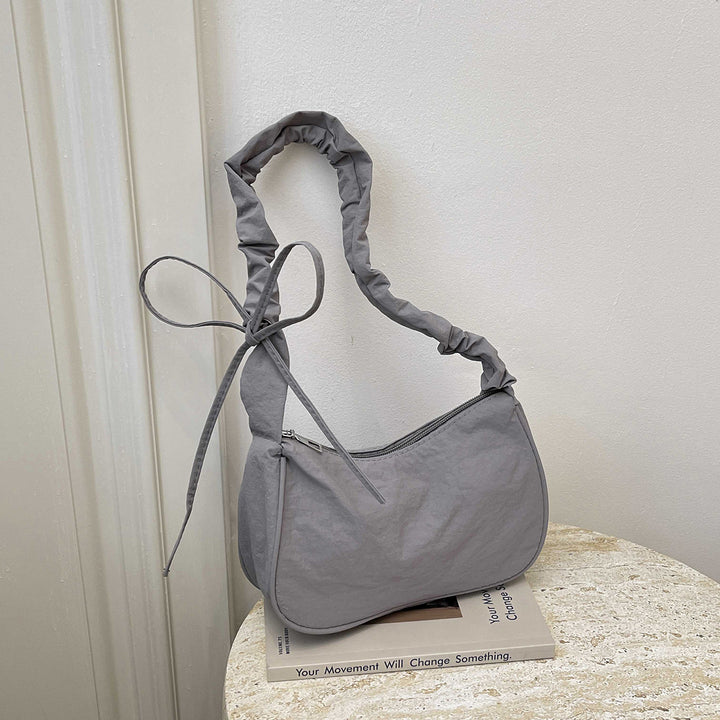WoTexturiertes Stoff Sling Bag Karnz