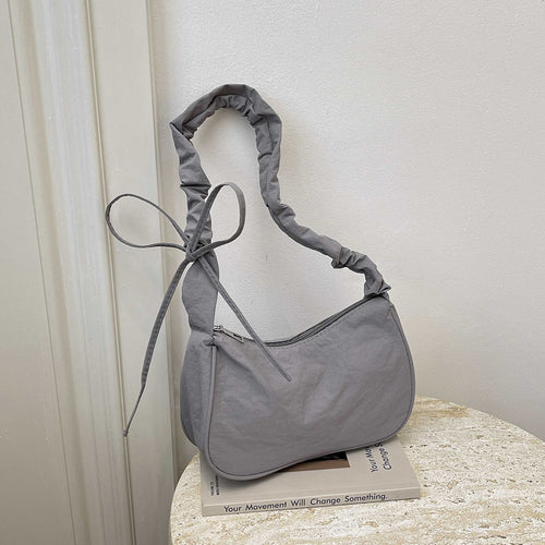WoTexturiertes Stoff Sling Bag Karnz