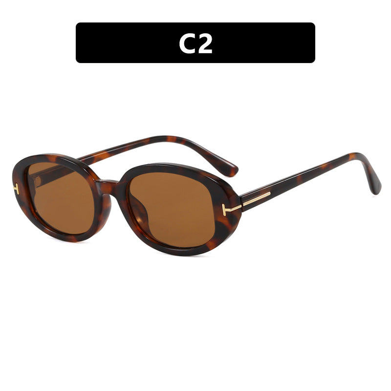 Damen stilvolle ovale Sonnenbrille mit goldenen Details Karnz