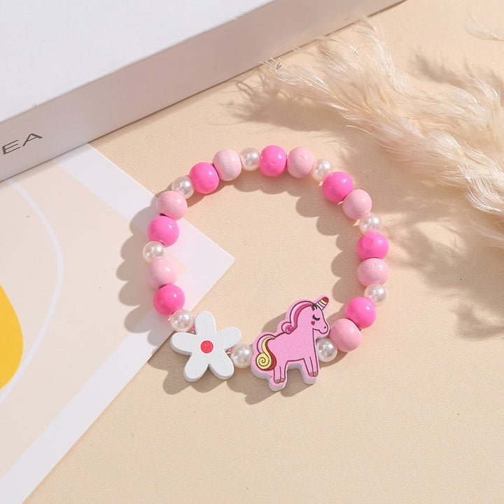 Verspieltes Kinderarmband mit Einhorn- und Blumenmotiv Karnz