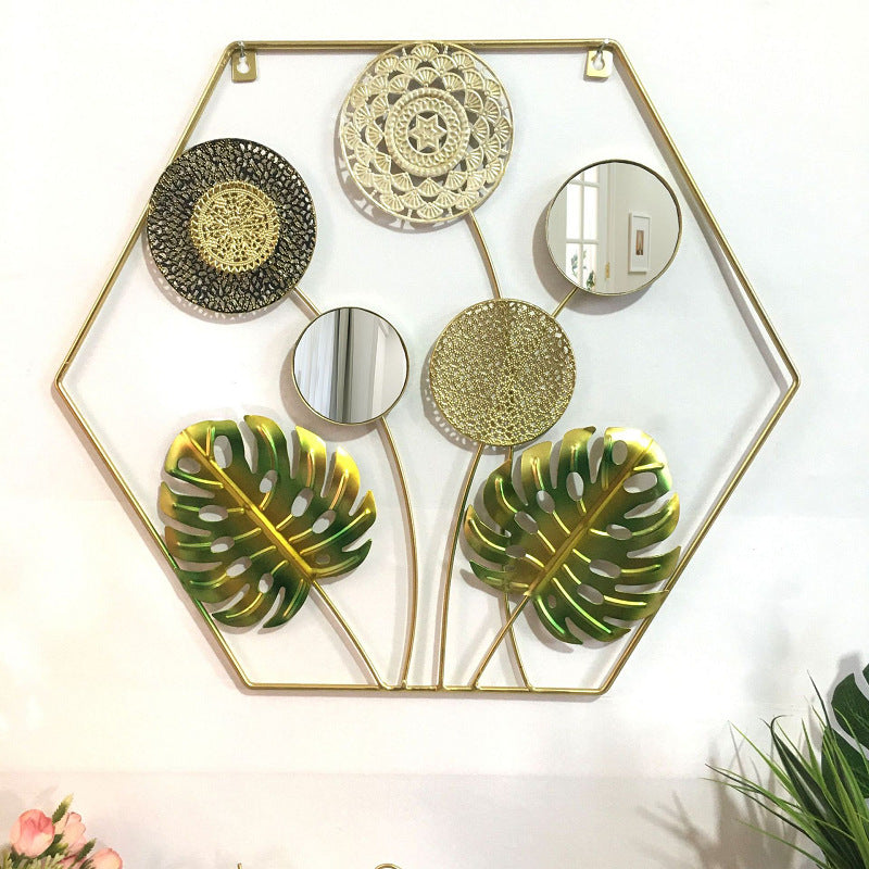 Dekorative Metallwandkunst mit tropischem Blatt- und Spiegeldesign Karnz