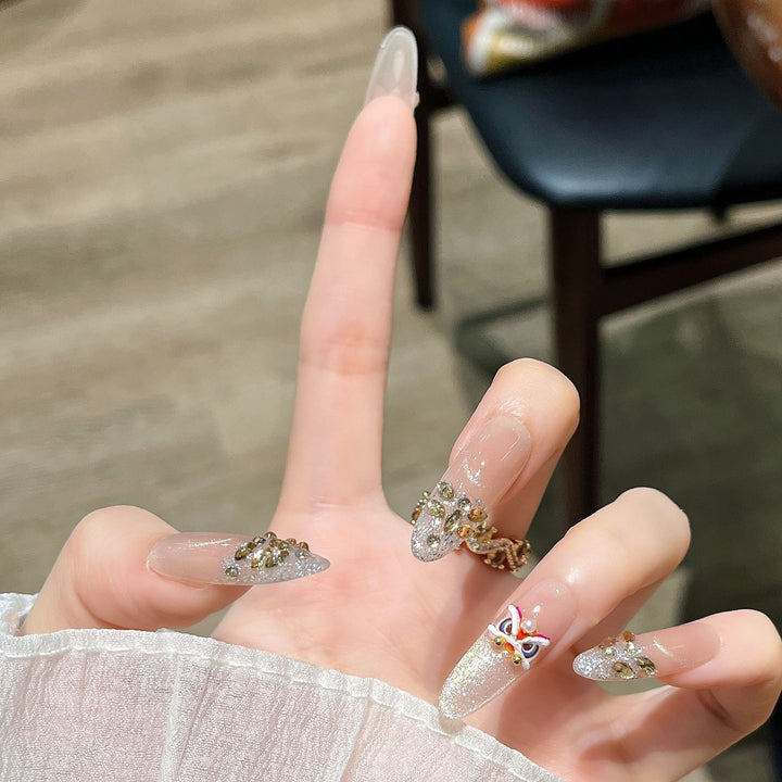 Dekorativer Strass Blumen Press-On Nail Set Karnz