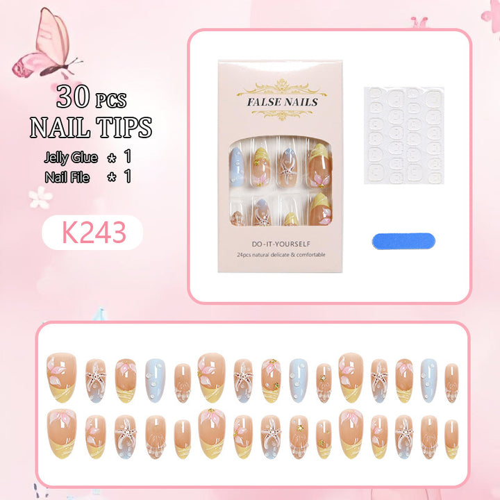 Kunstnagelset mit Floral-Motiven und Glitzerakzenten Karnz